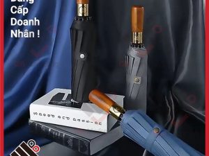 Ô dù cầm tay cán gỗ in logo theo yêu cầu số lượng lớn giá tốt tại Quatangmarketing.vn